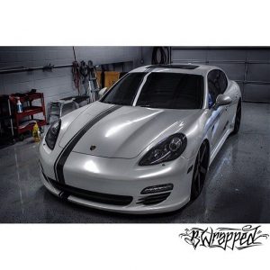 Porsche wrapped in Avery Gloss Pearl White vinyl