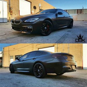 BMW wrapped in Avery SW Satin Black vinyl