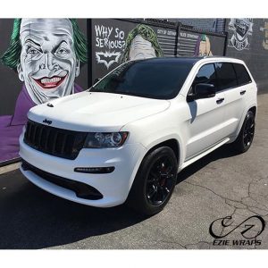 Jeep wrapped in Satin Pearl White vinyl