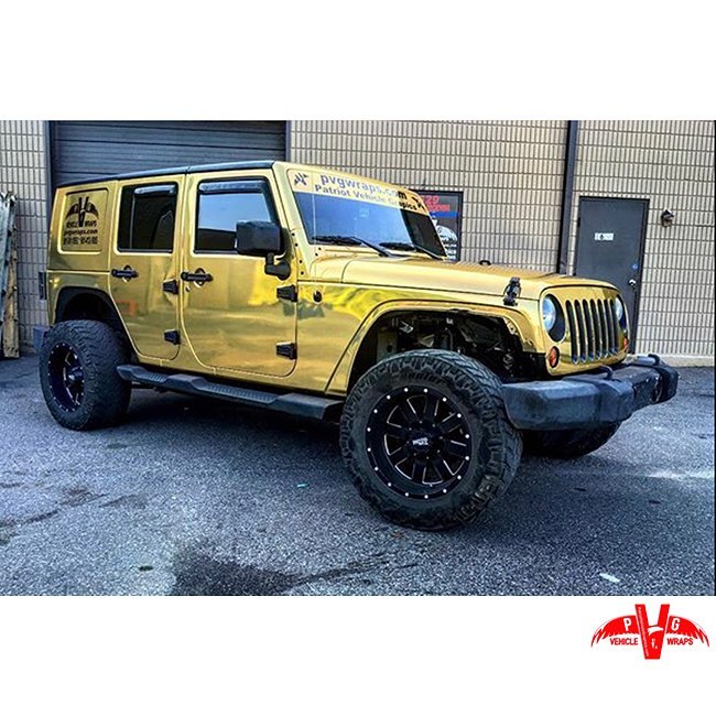 Jeep wrapped in Avery SW Gold Chrome vinyl