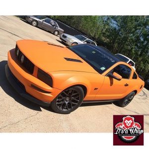 Ford Mustang wrapped in Avery SW Matte Orange vinyl