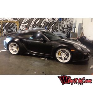 Porsche wrapped in Satin Black vinyl