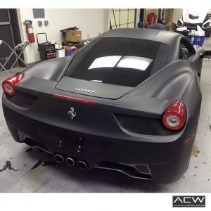 Ferrari wrapped in 3M 1080 Matte Deep Black vinyl