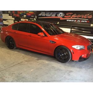 BMW wrapped in Gloss Dragon Fire Red vinyl