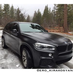 BMW wrapped in Avery SW Satin Black vinyl