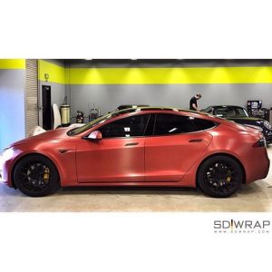 Tesla wrapped in Arlon UPP Brushed Red Aluminum vinyl