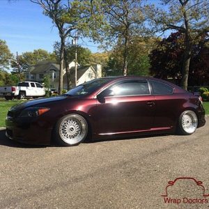 Scion wrapped in 3M 1080-GP99 Gloss Black Rose