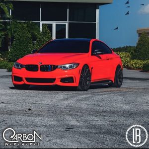 BMW wrapped in 3M 1080-VCW 17072 Satin Fluorescent Neon Red