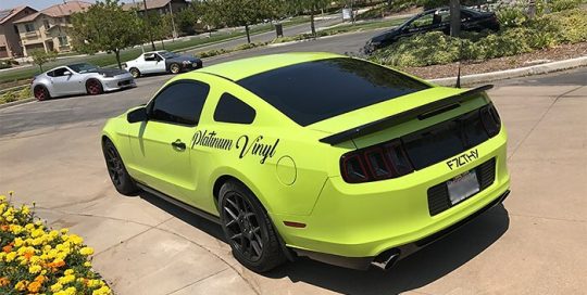 Ford Mustang wrapped in Neon Fluorescent Pink vinyl