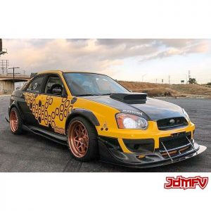 Subaru wrapped in 1080 Satin Gold Dust Black and Gloss Sunflower Yellow vinyls