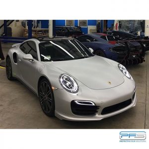 Porsche wrapped in 1080 Satin White Aluminum vinyl