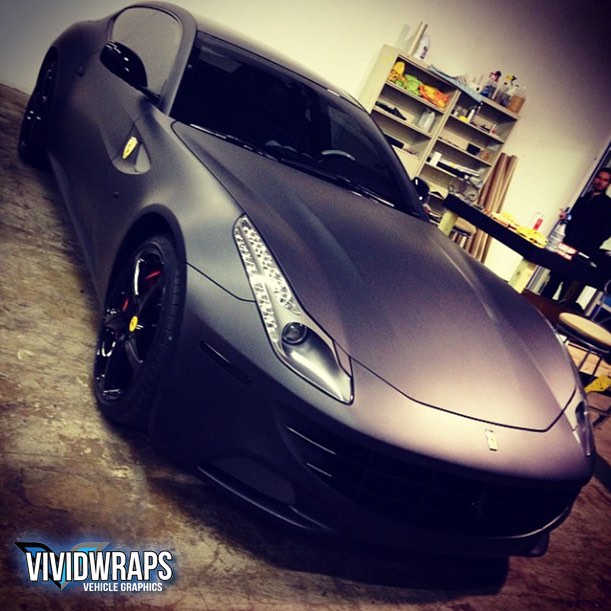 Ferrari wrapped in custom printed 3M 1080 Matte Deep Black vinyl