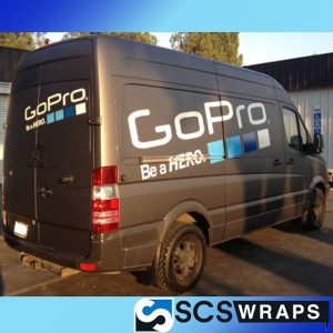 Van wrapped in 1080 Matte Dark Grey and 680 Reflective vinyl overlays