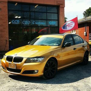 BMW wrapped in 1080 Gloss Gold Metallic vinyl