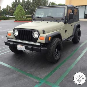 Jeep Wrangler wrapped in Avery SW Satin Khaki Green vinyl