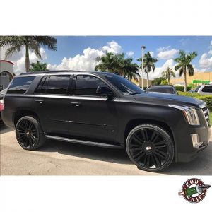 Cadillac Escalade wrapped in Satin Black vinyl