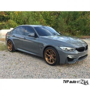 BMW M3 wrapped in Avery SW Gloss Dark Grey vinyl