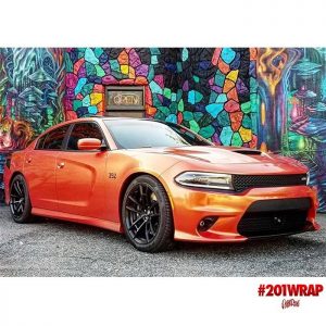 Dodge Charger wrapped in Orafol Shift Effect Gloss Sunset Orange/Red shade shifting vinyl Orafol Shift Effect Gloss Sunset Orange/Red shade shifting vinyl