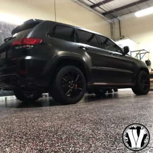 Jeep Cherokee wrapped in Avery SW Satin Black vinyl