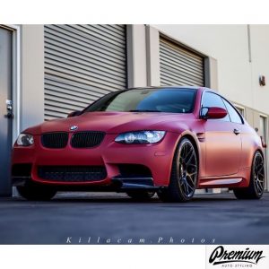 BMW wrapped in Matte Red Metallic vinyl