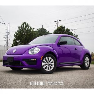 Volks Wagen Beetle wrapped in Gloss Plum Explosion vinyl