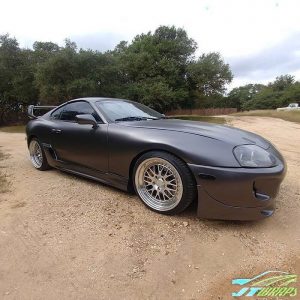 Toyota Supra wrapped in Satin Dark Gray vinyl