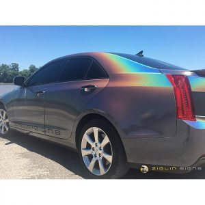 Cadillac wrapped in Psychedelic shade shifting vinyl