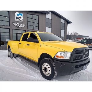 Dodge Ram wrapped in Gloss Bright Yellow vinyl