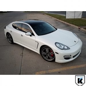 Porsche Panamera wrapped in Avery SW Satin Pearl White vinyl