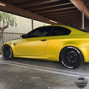 BMW M3 wrapped in Satin Bitter Yellow vinyl