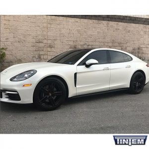 Porsche Panamera wrapped in Avery SW Satin Pearl White vinyl