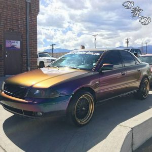 Audi wrapped in Avery ColorFlow Gloss Lightning Ridge Green/Purple shade shifting vinyl