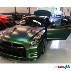 Nissan GTR wrapped in Avery Satin Urban Jungle Silver/Green/Purple shade shifting vinyl