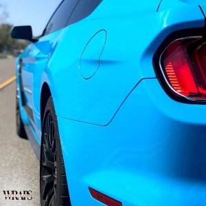 Ford Mustang wrapped in Avery SW Gloss Light Blue vinyl