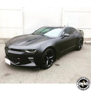 Camaro wrapped in Satin Black and Gloss Black vinyls