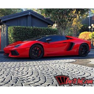 Lamborghini Aventador wrapped in Avery SW Gloss Carmine Red vinyl