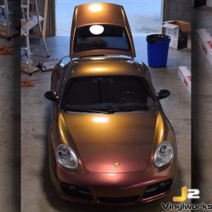 Porsche Cayman wrapped in Orafol Shift Effect Gloss Aubergine Bronze shade shifting vinyl