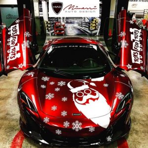 McLaren 650S wrapped in plotter cut graphics using 3M 1080 Satin White vinyl