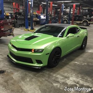 Camaro wrapped in Avery SW Gloss Light Green Pearlescent vinyl