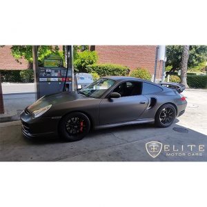 Porsche 911 wrapped in Avery SW Satin Pearl Nero vinyl