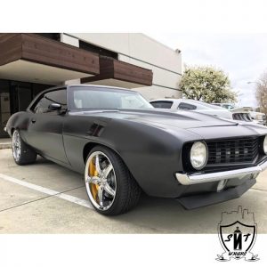 Dodge Challenger wrapped in Satin Pearl White vinyl