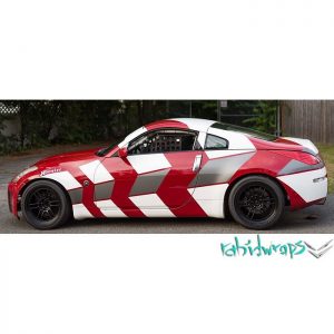 Nissan 350Z wrapped in Gloss White and Avery SW Gunmetal Metallic vinyls over red base paint