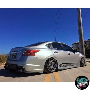 Nissan Altima wrapped in Orafol Shift Effect Gloss Pearl/Green shade shifting vinyl