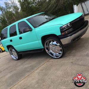 Chevy Tahoe wrapped in Orafol 970RA Matte Mint vinyl