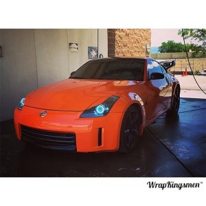 Nissan 370Z wrapped in Avery SW Gloss Orange vinyl