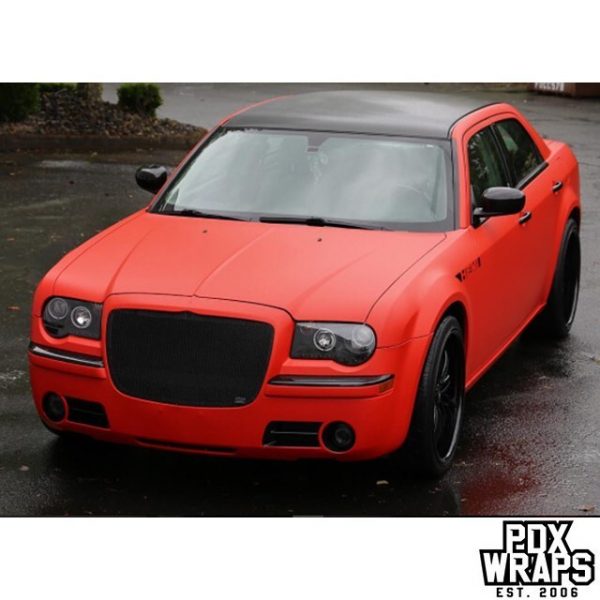 Chrysler 300 wrapped in Matte Red and Brushed Black vinyls