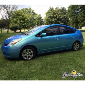 Toyota Prius wrapped in Orafol 970RA Shift Effect Green/Blue Colorshift vinyl