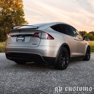 Tesla wrapped in 3M 1080 Matte Dark Gray vinyl