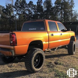 Chevrolet Silverado Wrapped in 3M 1080 Gloss Liquid Copper Vinyl