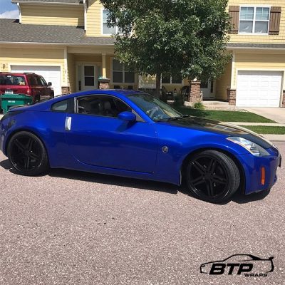 Nissan 350z wrapped in 3M 1080 Gloss Blue Raspberry vinyl